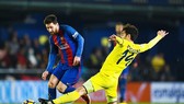 Barca (đỏ xanh) hứa hẹn gặp khó trước Villarreal. Ảnh: Getty Images