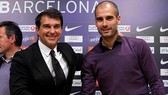 Joan Laporta sẵn sàng hợp tác với Pep Guardiola lần nữa nếu đắc cử Chủ tịch Barca. Ảnh: Getty Images