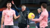 HLV Chris Wilder thừa nhận chỉ phép màu mới giúp Sheffield United trụ hạng. Ảnh: Getty Images    