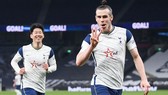 Gareth Bale ăn mừng khi hoàn tất hat-trick. Ảnh: Getty Images 