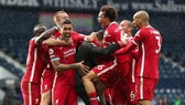 Liverpool ăn mừng bàn thắng có thể là quan trọng nhất mùa giải của mình. Ảnh: Getty Images