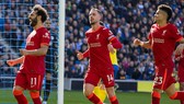 Liverpool ghi chiến thắng thứ 8 liên tiếp để bám đuổi Man.City. Ảnh: Getty Images