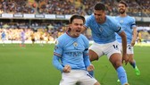 Jack Grealish phấn khích tột độ khi ghi bàn thắng đầu tiên của mùa giải. Ảnh: Getty Images