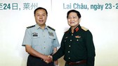 Đại tướng Ngô Xuân Lịch, Bộ trưởng Bộ Quốc phòng Việt Nam tiếp Thượng tướng Phạm Trường Long, Phó Chủ tịch Quân ủy Trung ương Trung Quốc. Ảnh: TTXVN