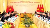 Đồng chí Phạm Bình Minh, Ủy viên Bộ Chính trị, Phó Thủ tướng Chính phủ, Bộ trưởng  Bộ Ngoại giao và Ủy viên Quốc vụ, Bộ trưởng Bộ Ngoại giao Trung Quốc Vương Nghị đồng chủ trì Phiên họp lần thứ 11 Ủy ban Chỉ đạo hợp tác song phương Việt Nam - Trung Quốc. 