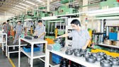 Sản xuất linh kiện cao su tại Công ty Cổ phần Cao su Thống Nhất Ảnh: CAO THĂNG
