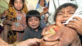 Tiêm vaccine phòng sởi cho trẻ em tại Kabul, Afghanistan. Nguồn: TTXVN