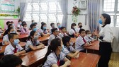 Học sinh khối 5, Trường Tiểu học An Hội (quận Gò Vấp)  trong ngày đầu tiên trở lại trường sau hơn 3 tháng nghỉ học vì dịch bệnh