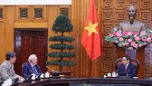Thủ tướng Phạm Minh Chính tiếp ông Thomas Vallely, Giám đốc Chương trình Việt Nam  tại Đại học Havard. Ảnh: TTXVN