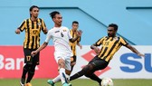 U22 Malaysia (áo sậm) giành vé vào bán kết khi thắng U22 Myanmar 3-1.