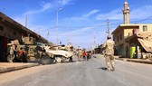Binh sỹ Iraq trong chiến dịch truy quét IS tại khu vực thành phố Rawa, gần biên giới với Syria, ngày 18-11 vừa qua. Ảnh: TTXVN