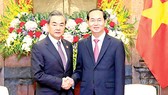 Chủ tịch nước Trần Đại Quang tiếp Ủy viên Quốc vụ, Bộ trưởng Bộ Ngoại giao Trung Quốc Vương Nghị. Ảnh: TTXVN