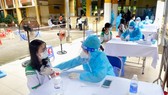 Tiêm vaccine phòng Covid-19 cho học sinh (ảnh minh họa). Ảnh: CAO THĂNG