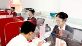 Hiện nhiều ngân hàng đang cho vay mua nhà để ở với lãi suất hợp lý. Ảnh: Phan Lê