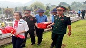 Lễ tiếp nhận các hài cốt liệt sĩ quân tình nguyện và chuyên gia Việt Nam hi sinh tại nước CHDCND Lào về an táng tại nghĩa trang Đồng Tâm