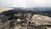  Rừng cây bị cháy rụi tại La Teste-de-Buch, miền Tây Nam Pháp ngày 21-7-2022. Ảnh: AFP/TTXVN