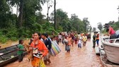 Chính phủ Lào vẫn đang hỗ trợ người dân trong khu vực bị ảnh hưởng. Ảnh: Reuters