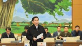 Bộ trưởng Bộ Giao thông Vận tải Nguyễn Văn Thể  báo cáo tại phiên họp. Ảnh: VIẾT CHUNG