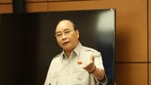 Chủ tịch nước Nguyễn Xuân Phúc phát biểu tại phiên họp tổ. Ảnh: QUANG PHÚC