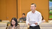 Phó Tổng Kiểm toán nhà nước Ngô Văn Tuấn báo cáo tại phiên họp