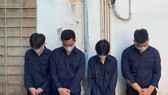 Nhóm đối tượng tại cơ quan công an. Ảnh: CHÍ THẠCH