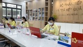 Quận 11 trả kết quả giải quyết thủ tục hành chính qua bưu điện và thanh toán không dùng tiền mặt