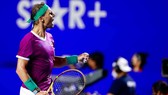 Nadal lại đánh bại Djokovic