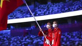 Huy Hoàng bất ngờ được chọn làm người cầm cờ cho Đoàn thể thao Việt Nam tại Lễ khai mạc SEA Games 31. Ảnh: D.V
