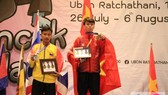 Võ sĩ Thanh Phong giành tấm HCV cho Đoàn thể thao sinh viên Việt Nam ở môn pencak silat. Ảnh: BTC