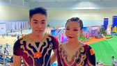 Hai VĐV Quang Mạnh, Uyên Nhi đã giành tấm HCV nhóm tuổi trẻ đầu tiên cho đội aerobic Việt Nam ở giải vô địch châu Á 2022. Ảnh: Aerobic Việt Nam