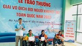 Các VĐV bơi thể thao người khuyết tật đã bước vào thi đấu các nội dung trong ngày 11-9 tại Hà Nội. Ảnh: NGỌC ANH