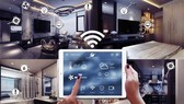 With a tablet, the owner of a domotics can easily monitor and control smart devices in his or her house.