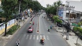 Lượng phương tiện lưu thông trên trục đường Quang Trung (quận Gò Vấp) ngày 29-9 khá đông đúc. Ảnh: BÙI ANH TUẤN