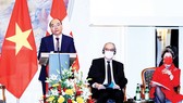 Chủ tịch nước Nguyễn Xuân Phúc phát biểu tại Diễn đàn Doanh nghiệp Việt Nam - Thụy Sĩ. Ảnh: TTXVN