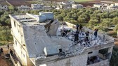 Toà nhà nơi thủ lĩnh IS ở bị tên này cho nổ tung vào hôm 3-2. Ảnh: AP