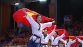 Bài biểu diễn quyền sáng tạo mang về tấm HCV đầu tiên cho đội tuyển taekwondo Việt Nam tại SEA Games 31. Ảnh: DŨNG PHƯƠNG