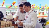 Ban điều hành hỗ trợ khởi nghiệp sáng tạo tỉnh Quảng Nam ký kết hợp tác với Hiệp hội khởi nghiệp quốc gia. Ảnh: NGUYỄN CƯỜNG