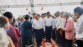 Chủ tịch nước Nguyễn Xuân Phúc thăm và tặng quà cho các gia đình thương binh, liệt sĩ ở Quảng Nam
