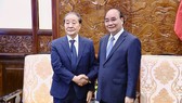 Chủ tịch nước Nguyễn Xuân Phúc tiếp ông Choi Young-joo, nguyên Chủ tịch Hội Hữu nghị Hàn Quốc - Việt Nam, Chủ tịch Tập đoàn Panko. Ảnh: QUẾ SƠN