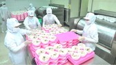 Food processing at an enterprises whose controlling stake is held by CJ Group. (Photo: SGGP)