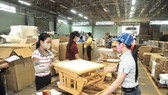 Vietnam's wood export turnover encounters difficulties because of the Covid-19 pandemic. (Photo: SGGP)