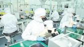 Electronic component production at MTEX Company (Japan) in HCMC. (Photo: SGGP)