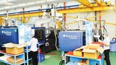 Production of high-tech plastic products at Saigon Industry Corporation. (Photo: SGGP)
