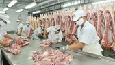 Meat processing at Vissan Company. (Photo: SGGP)