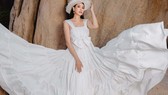 Hoa hậu Hà Kiều Anh với trang phục linen của NTK Đỗ Mạnh Cường