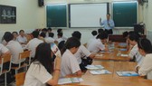 Học sinh lớp 9/6 Trường THCS Minh Đức tại buổi tư vấn hướng nghiệp có sự tham gia của phụ huynh. Ảnh: MINH QUÂN