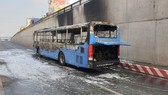 Bus catches fire.