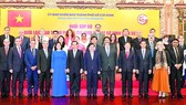 Secretary of the HCMC Party Committee Nguyen Van Nen (C), HCMC's leaders and delegates at the meeting