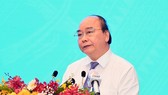 President Nguyen Xuan Phuc addresses the national conference in HCM City on March 17. (Photo: SGGP)