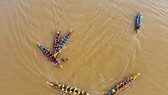 The annual traditional boat race aims at celebrating former General Secretary Le Duan's birthday.